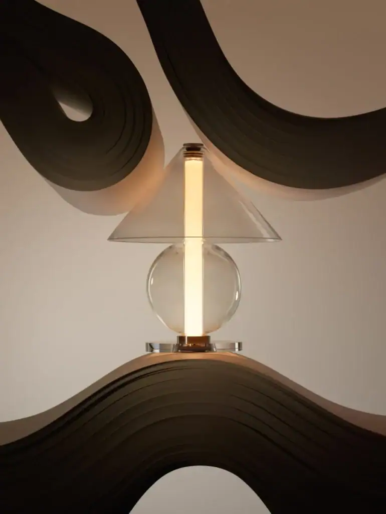 Marset Fragile table lamp, lit tube with a disc shade on a decorative base