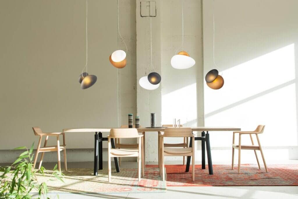 A-N-D Light Pebble pendant, cluster of rounded shades above a dining table