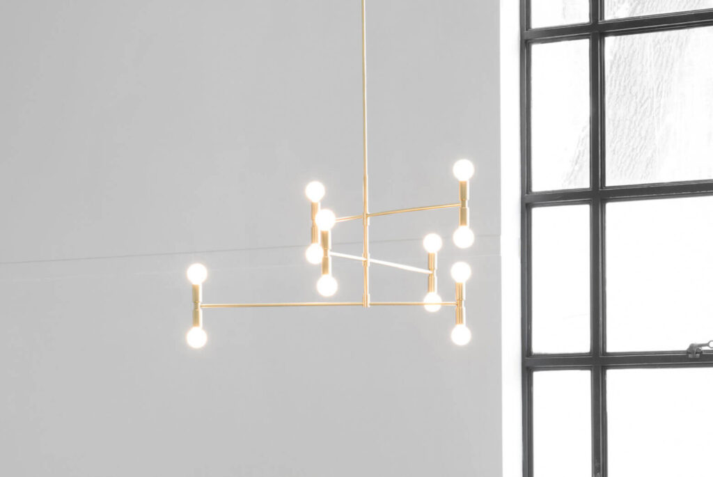 Lambert et Fils Dot pendant in brass, detail of the branching arms