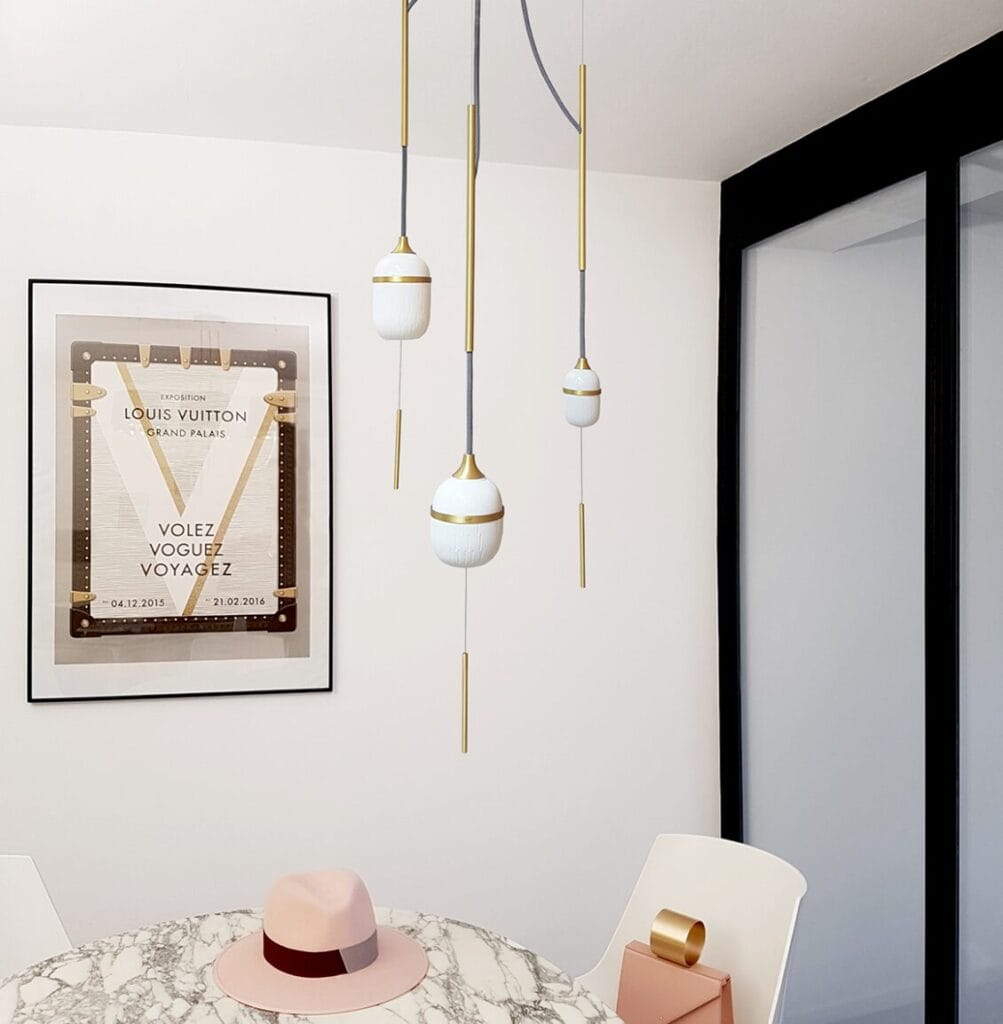 Designheure Fleur de Kaolin pendant, multi-drop fixture above a styled console