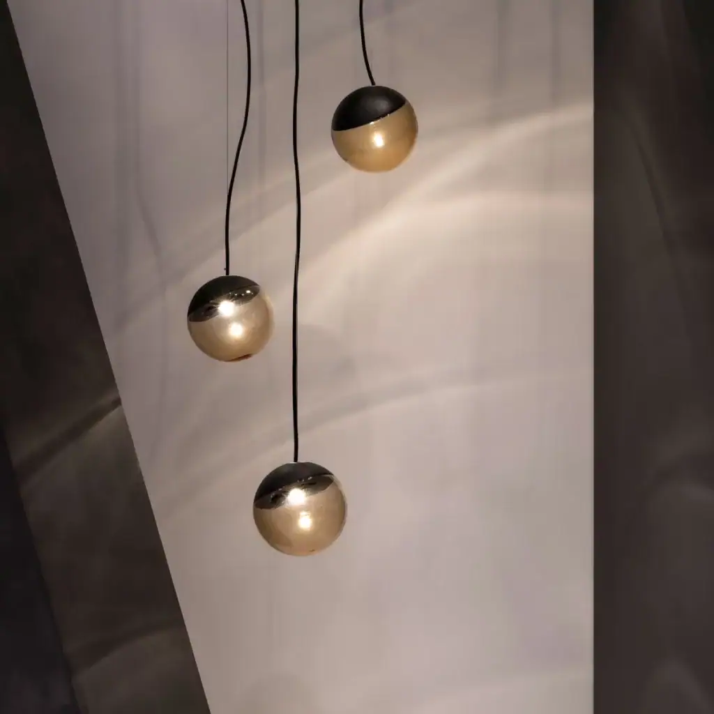 Delta Light Gibbo pendant, three spheres at varying drop heights, close-up