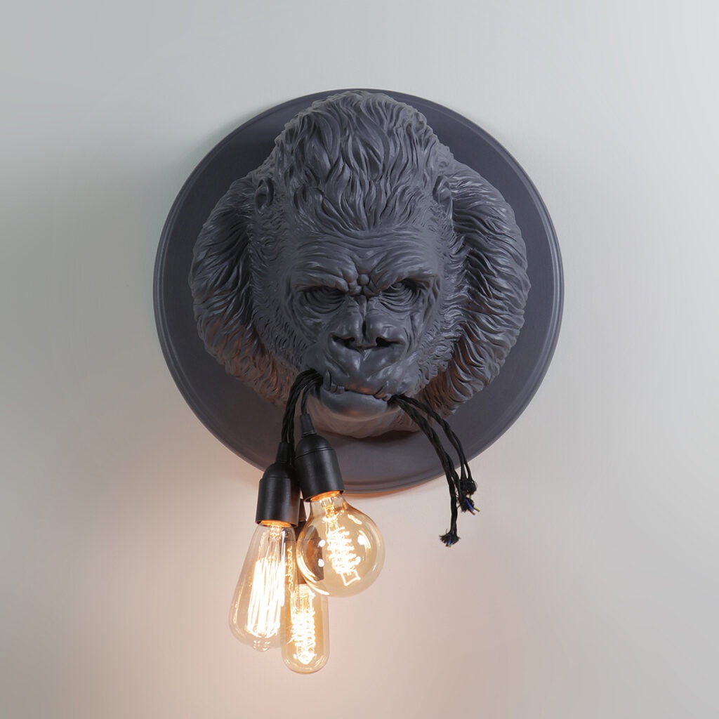 Karman Ugo Rilla wall light in grey, close-up with exposed bulbs
