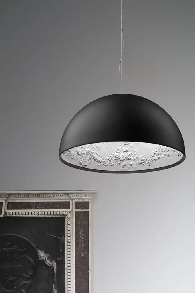 Flos Skygarden pendant in black, near a fireplace