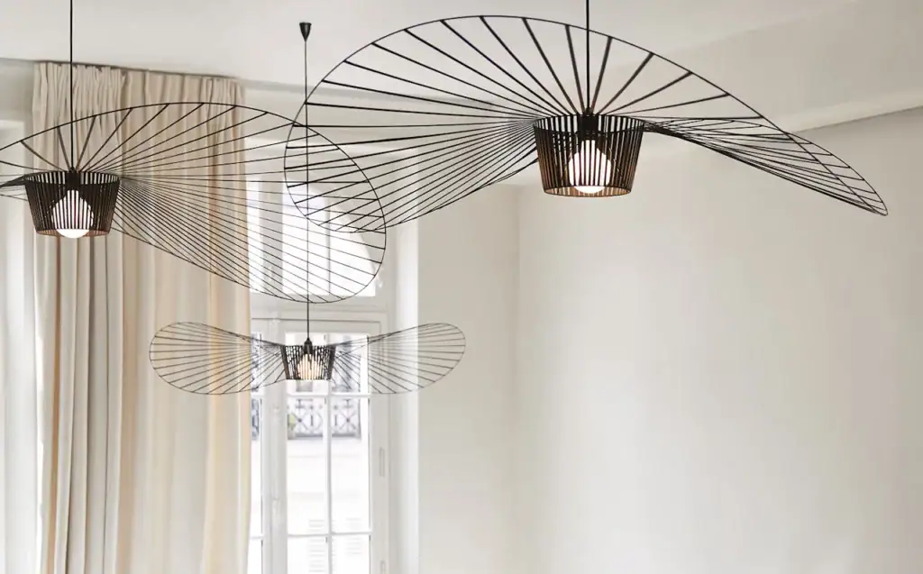 Petite Friture Vertigo pendant, pair above sheer curtains in a bright room