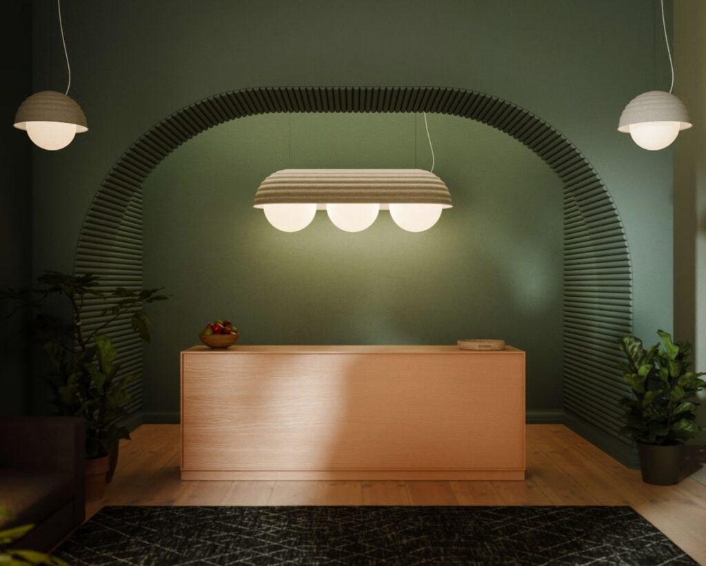 RBW Bon pendant, lit above a reception desk