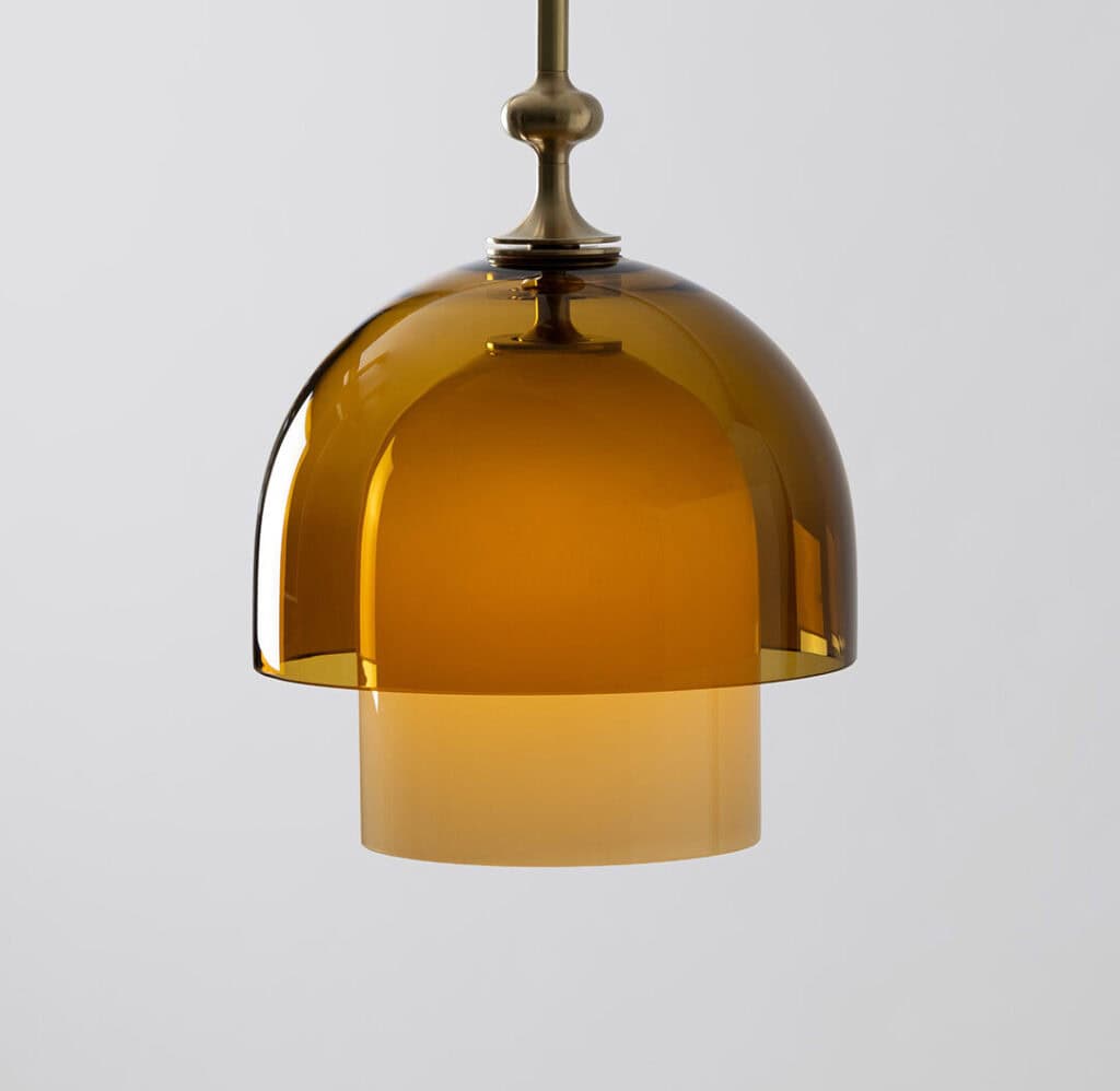 Decorative amber pendant light with metallic fixture.