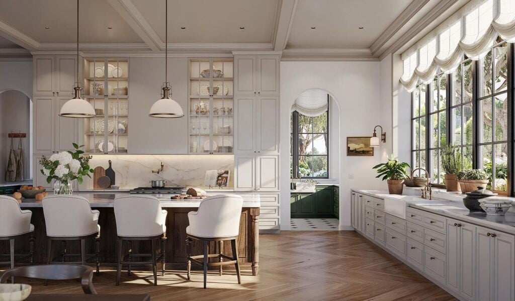 Classic white kitchen with marble counters and pendant lights on Lutron HomeWorks control