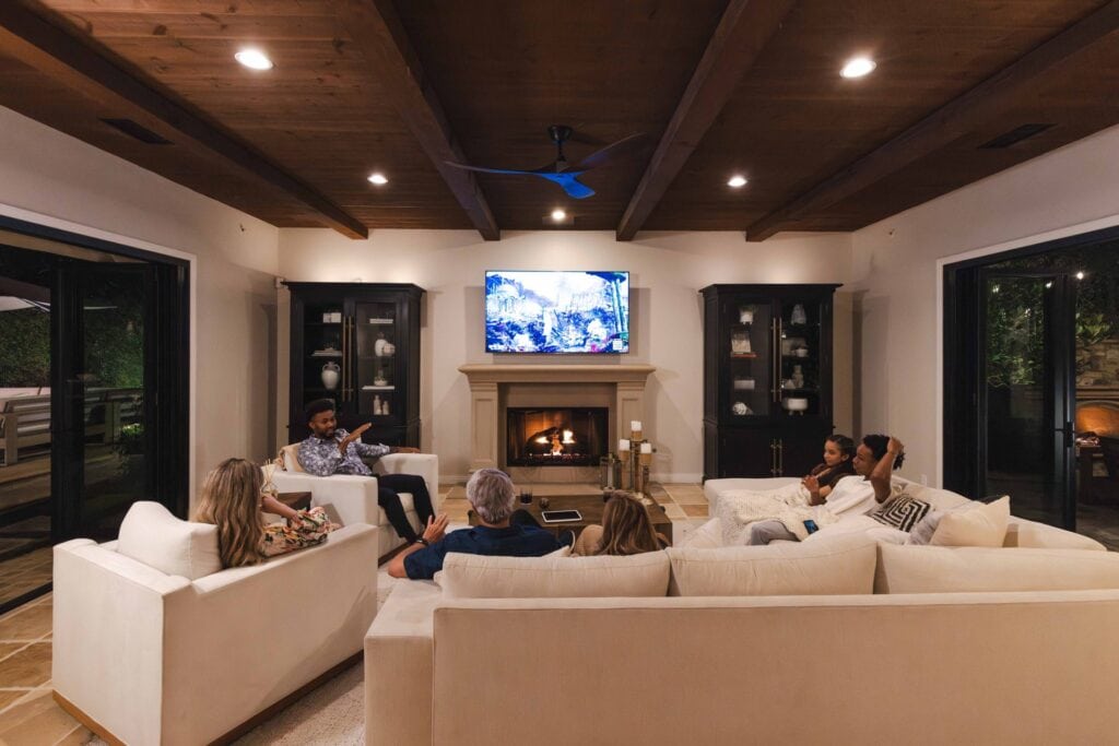 Warm media room with Sonance in-ceiling speakers for surround sound